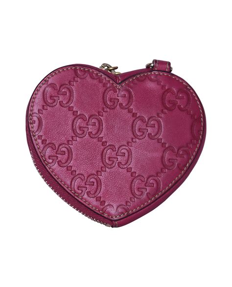 gucci heart shaped coin purse|black gucci purse with heart.